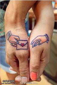 Affectional Tattoo Pattern on a Couple's Hand