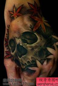 hand back skull maple leaf tattoo pattern