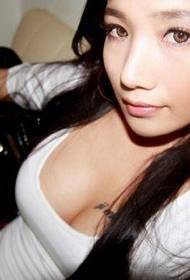 woman's chest sexy English tattoo