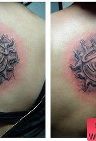 tillbaka par märkesvaror sol tatuering mönster