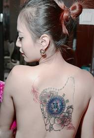 Fashion beauty behind the cosmic star personality tattoo pictures