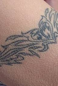 Tribal black line vine arm tattoo pattern