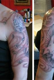 Motif de tatouage colombe et fleurs volantes