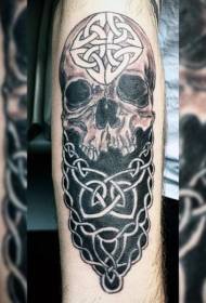 Black and white mysterious skull and celtic decorative arm tattoo pattern