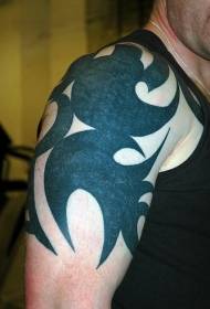 Large black tattoo tattoo on the shoulder