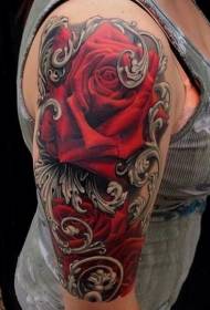 Ang magagandang pulang rosas na may pandekorasyon na pattern ng tattoo