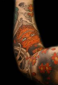 Motif de tatouage avatar monstre bras orange barbe