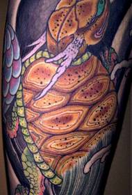 Foto tatuaggio braccio tartaruga gialla grande di colore