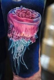 Барвистий і дуже реалістичний чудовий малюнок татуювання медузи рука