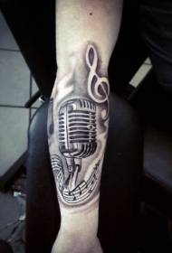 Disegnu simplice di microfonu in biancu è neru è mudellu di tatuaggi di bracciu di nota