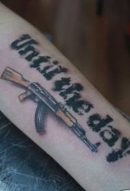 Ручно осликана пиштољ енглеског абецеде тетоважа узорак