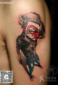 Morsom tegneseriefigur-tatovering