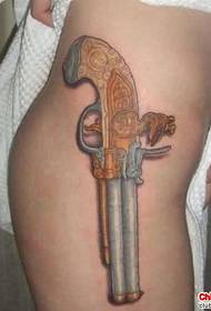 Modeli i tatuazhit me pistoletë të bukurisë fotografi të shumta