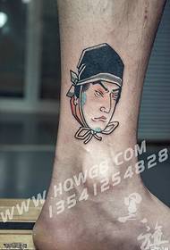 Tatuaggio di carattere giapponese sulla caviglia