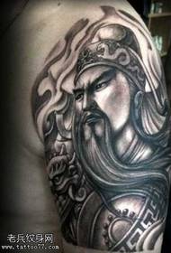Braccio nero grigio fuori dal modello di tatuaggio pubblico