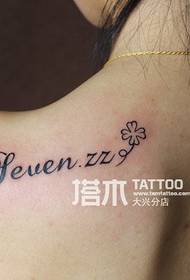 Beautiful English tattoo on the shoulder