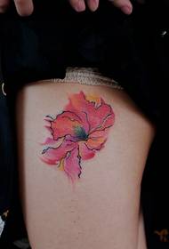 Red leaf tattoo pattern hidden in a corner