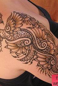 Beautiful arm beautiful totem peacock tattoo pattern