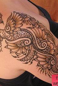Bel braccio bellissimo totem modello tatuaggio pavone