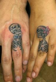 Par sjovt farverigt mand og kvinde skelet tatoveringsmønster