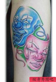 Patró de tatuatge femení: model de tatuatge de màscara de color del braç