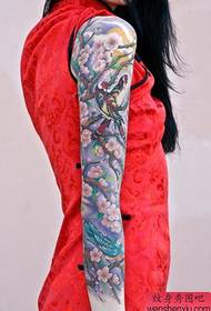 A beautiful flower arm magpie plum tattoo pattern