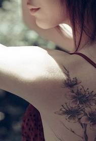 Woman back plum tattoo pattern