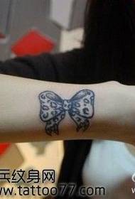 时尚经典的豹纹蝴蝶结纹身图案