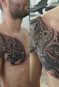 Механічний малюнок татуювання на правій грудях у чоловіків