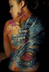 Grande drago blu e motivo tatuaggio ciliegia giapponese sul retro