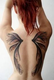 Lány vissza egy pár aranyos szárnyakkal tetoválás