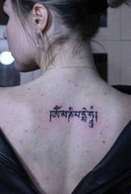Tebek moade Sanskrit tattoo