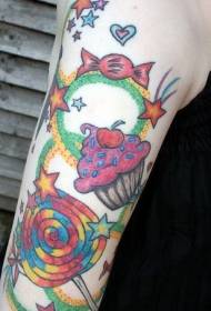 Braccio torta caramella e stelle motivo tatuaggio colorato