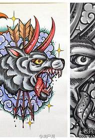 Popolare manoscritto tatuaggio testa di lupo fresco