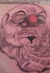 Atpakaļ lūdzoša klauna tetovējuma raksts
