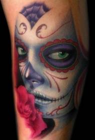 Legs with colorful creepy death girl tattoo
