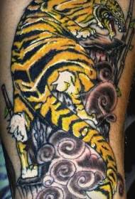 Yellow Tiger Crawling Tattoo Pattern on Rock