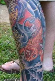motivo tatuaggio gamba calamari rossi
