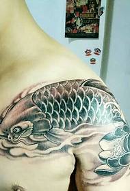 Black and white big squid tattoo picture of the shoulders