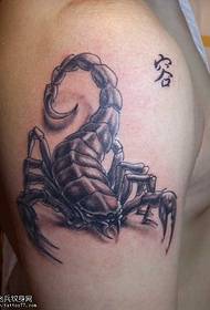 Modesch Pincet Tattoo op de Groussen Aarm