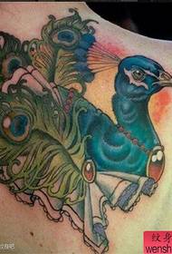 pola tattoo merak warna anu klasik Palasik