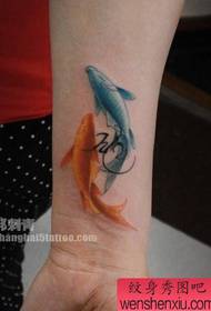 girl arm color small squid tattoo pattern