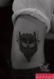 an owl tattoo pattern popular in the side waist classic