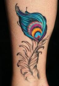 simpatico tatuaggio colorato con piume di pavone