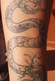 черно сива змия и модел на татуировка на мъртво дърво