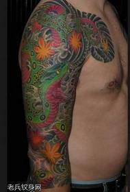 Нишони Tattoo мор нимсолаи сабз
