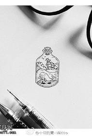 small dolphin tattoo pattern in the bottle