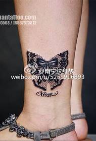Lace butterfly tattoo on ankle