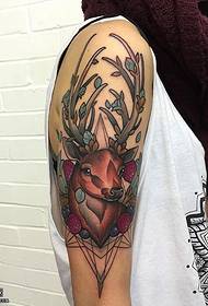 Flower deer tattoo pattern on the shoulder