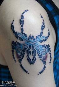 Braccio Totem Ragno Blu Tatuaggio